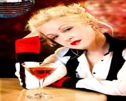 Cyndi Lauper consuming alcohol